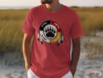 Man wearing red T-shirt with bear paw emblem